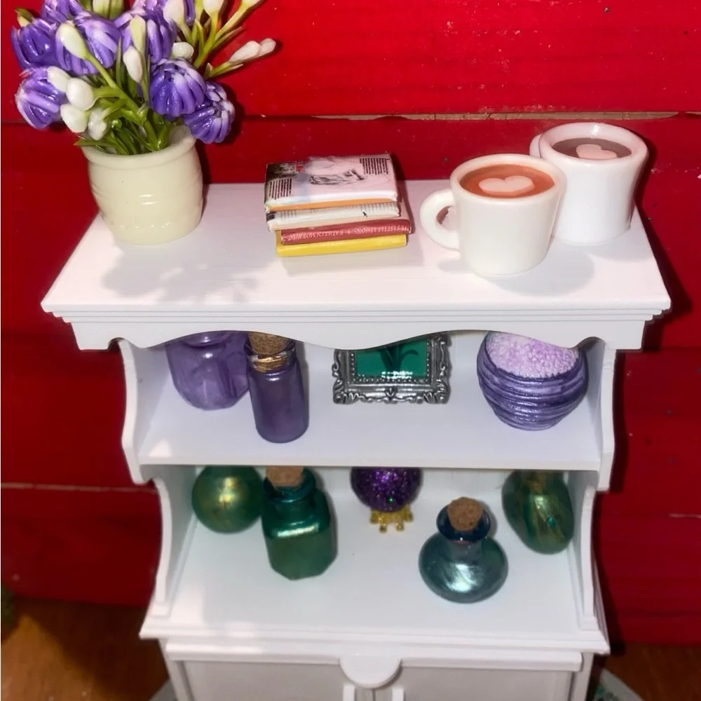 White Miniature Wall Shelf with Colorful Bottles